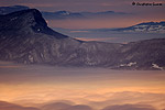 Ref. 8779  Mer de nuage éclairée par Chambéry, depuis le Mont Revard. Disponible en 30x45 et 50x75